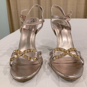 Unlisted strappy heels.